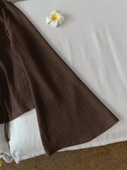 Casual Solid Color V-Neck Flare Sleeve Twist Front Blouse