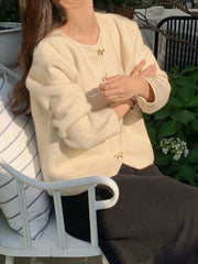 Women's Solid Color Long Sleeve Bow Button Loose Knit Cardigan